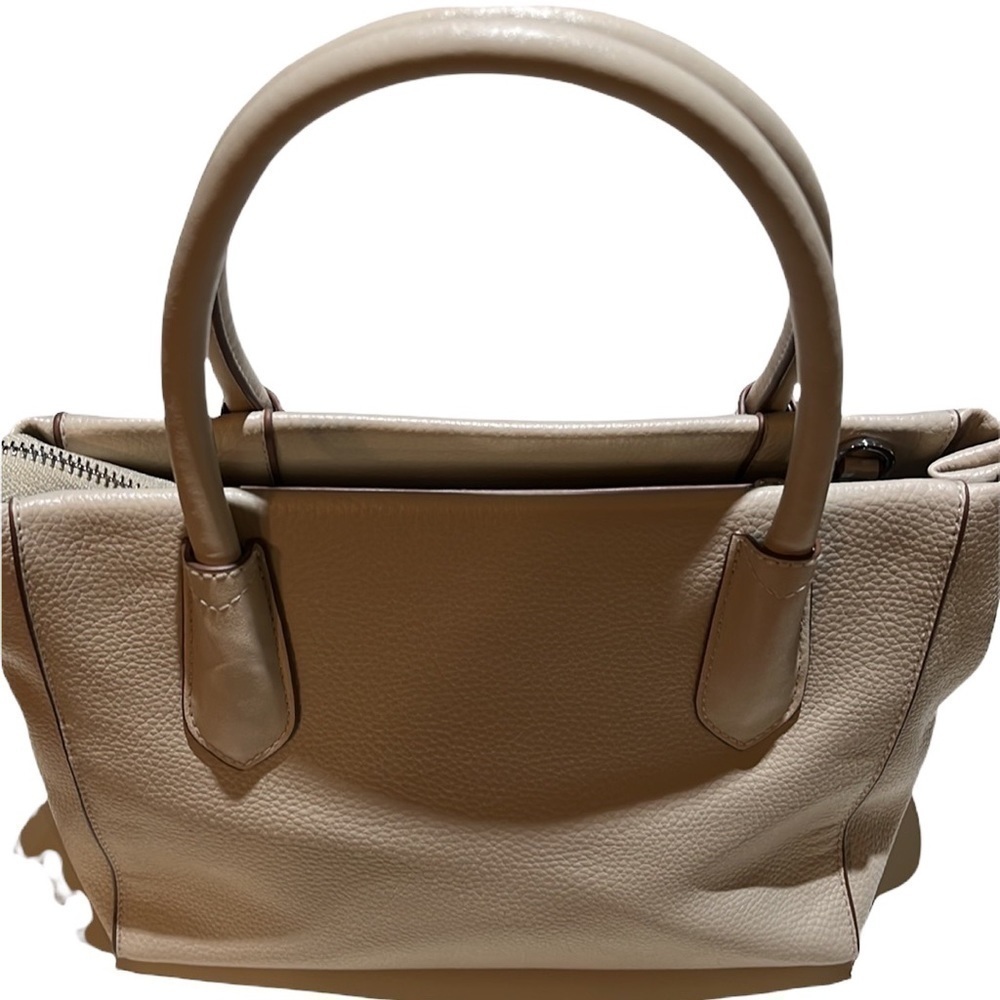 A new day beige hand bag